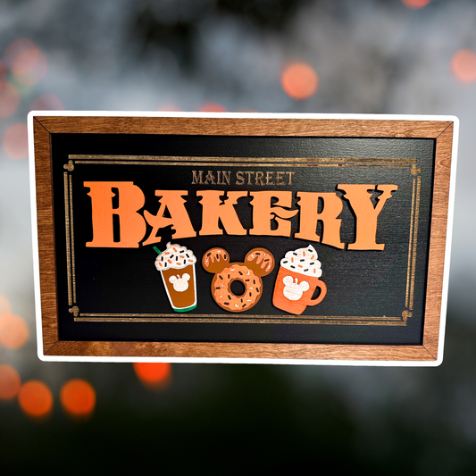 Orange Icing Fall Main Street Bakery | Black Background Framed Halloween Sign
