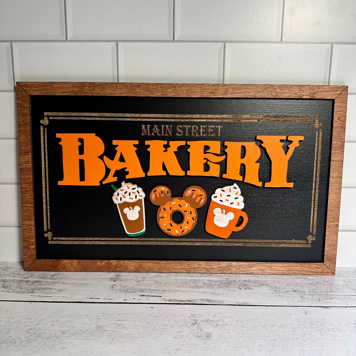 Orange Icing Fall Main Street Bakery | Black Background Framed Halloween Sign