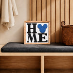 HOME square framed wood sign with blue mouse head icon styled on a mudroom bench