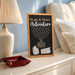 You Are My Favorite Adventure balloon house framed wood sign styled on a nightstand in a romantic guest room
