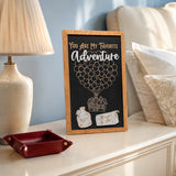 You Are My Favorite Adventure balloon house framed wood sign styled on a nightstand in a romantic guest room