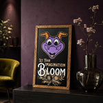 Let Your Imagination Bloom purple dragon framed wood sign styled in a botanical studio