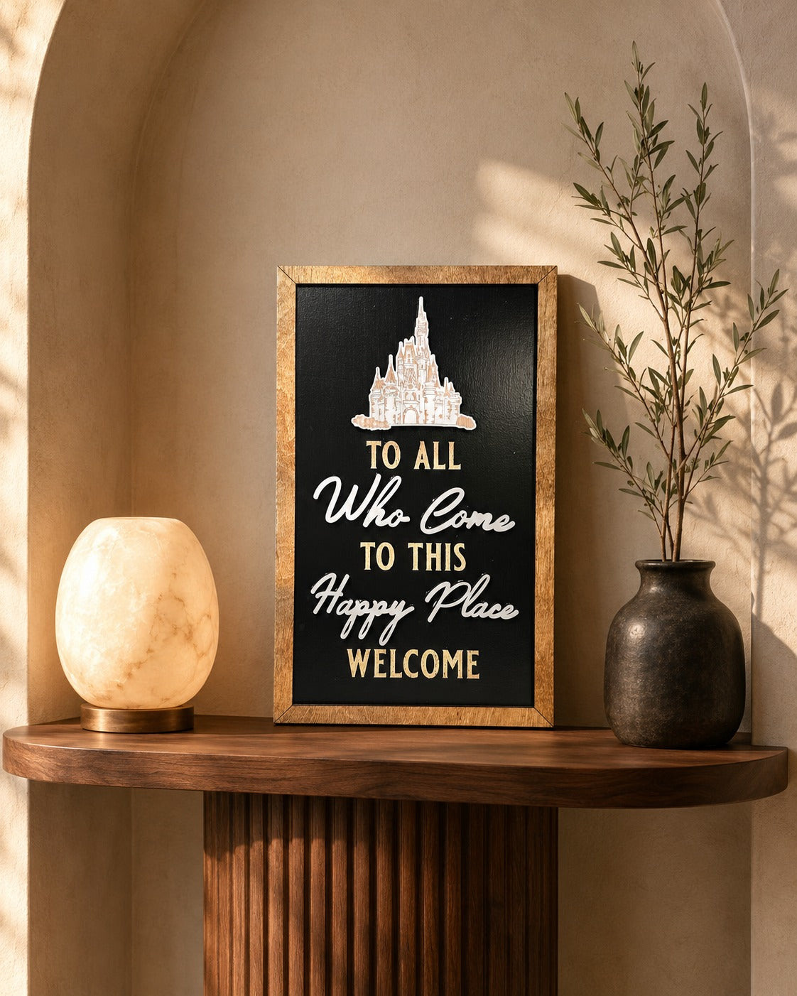 To All Who Come To This Happy Place Welcome dedication plaque framed wood sign styled in a golden hour vestibule