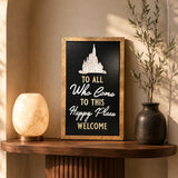 To All Who Come To This Happy Place Welcome dedication plaque framed wood sign styled in a golden hour vestibule