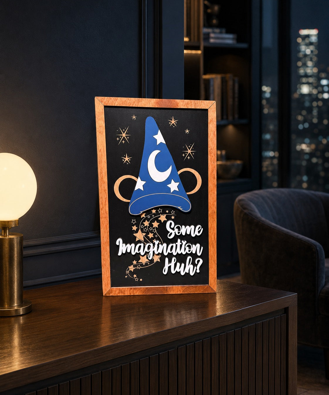 Some Imagination Huh sorcerer hat framed wood sign styled on a walnut console