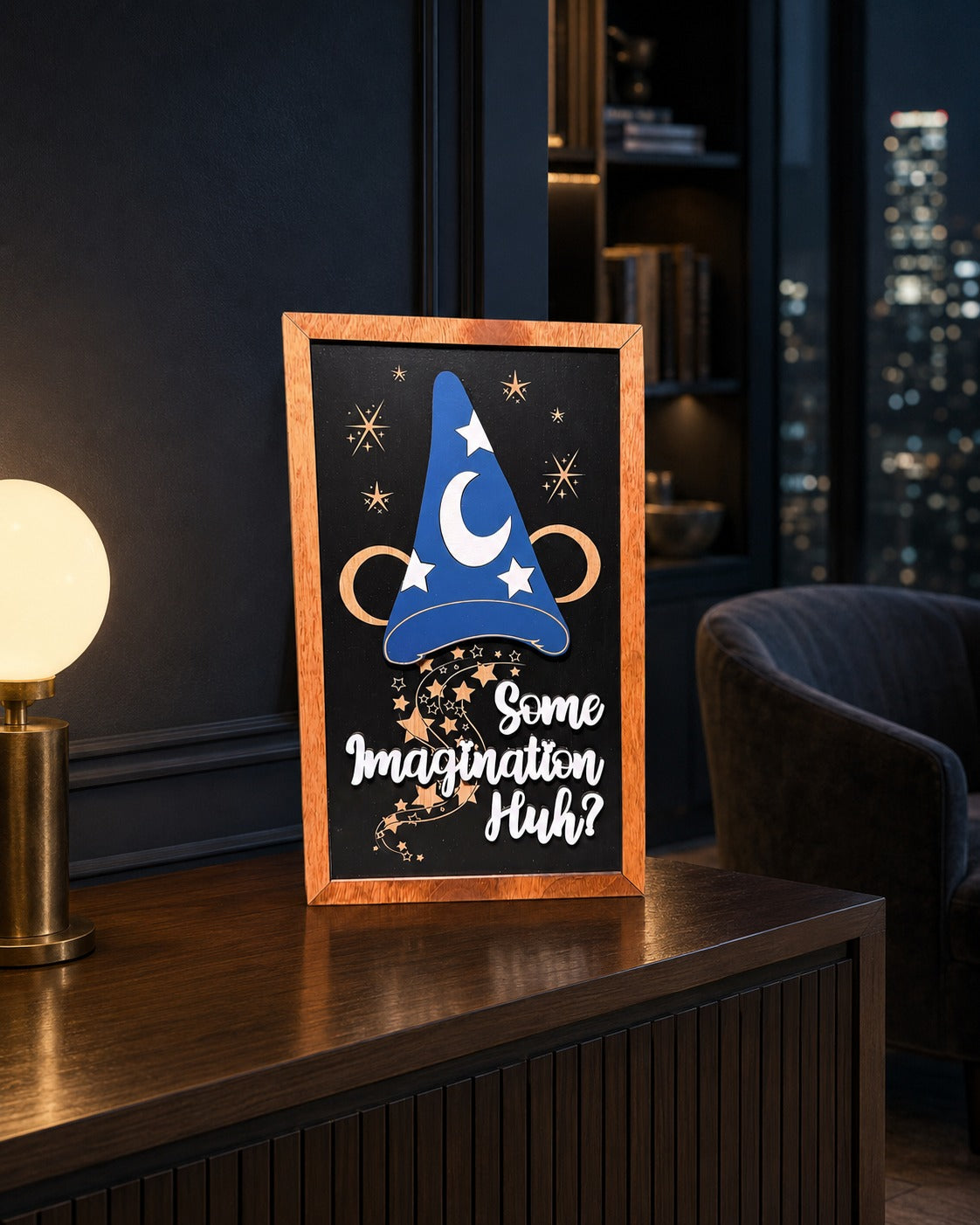 Some Imagination Huh sorcerer hat framed wood sign styled on a walnut console