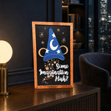 Some Imagination Huh sorcerer hat framed wood sign styled on a walnut console