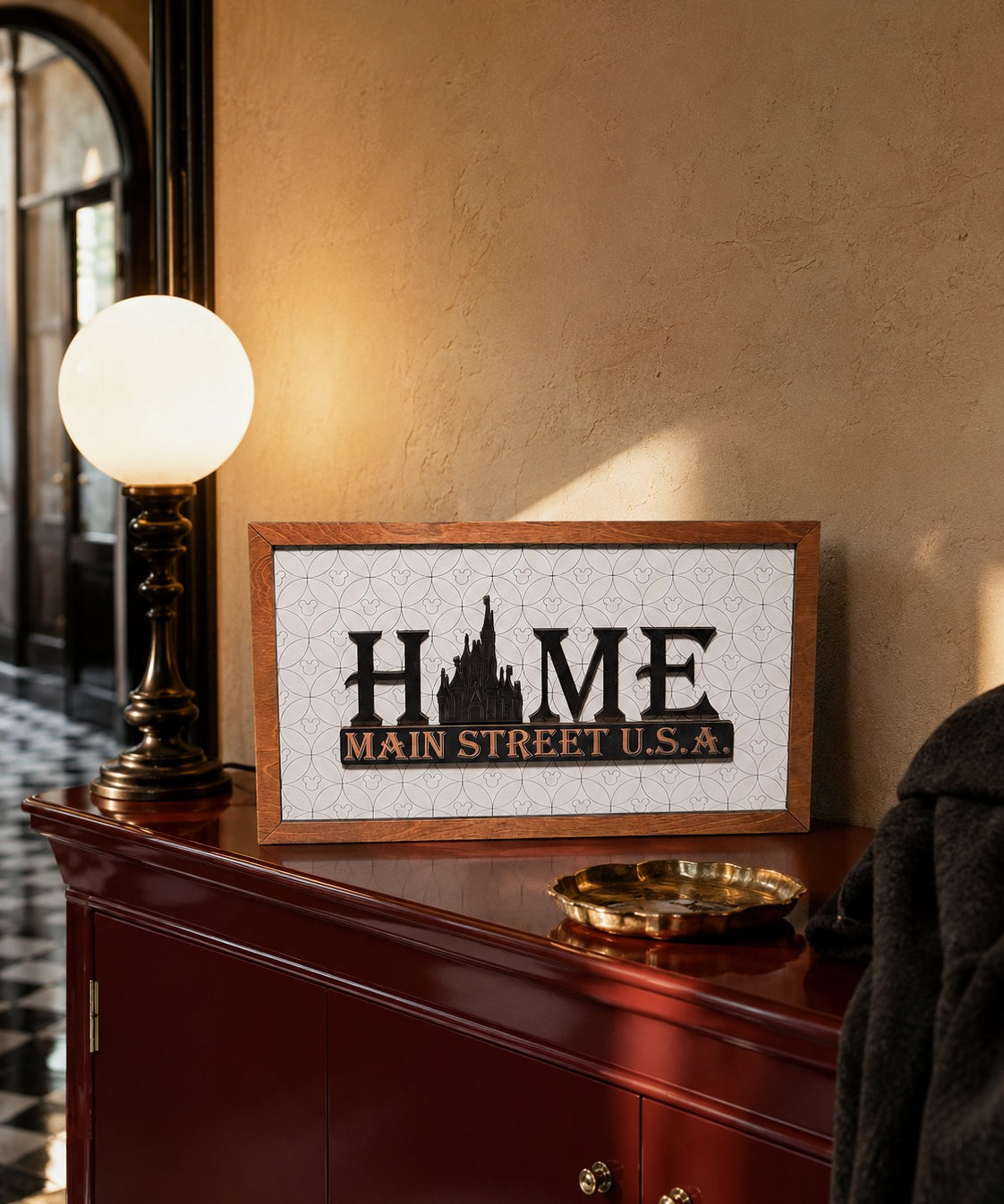 HOME Main Street USA castle framed wood sign styled on an elegant console