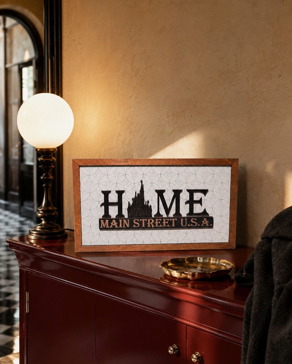 HOME Main Street USA castle framed wood sign styled on an elegant console