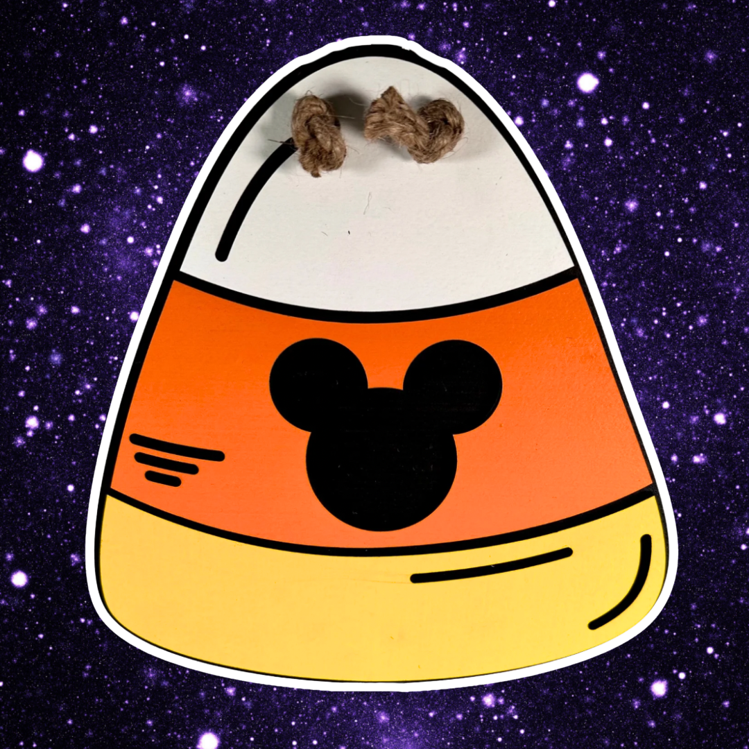Candy corn shaped mouse ear Halloween sign on starfield background