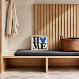 HOME square framed wood sign with blue mouse head icon styled on a pale oak mudroom bench