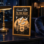 Second Star To The Right London skyline framed wood sign styled in a midnight reading nook