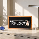 Here You Leave Today castle tribute framed wood sign styled on a sunlit travertine credenza