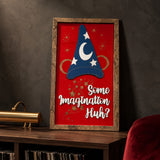 Some Imagination Huh red sorcerer hat framed wood sign styled on a smoked oak console