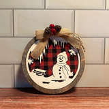 Round Wooden Red/Black Plaid Snowman Scene Ornament