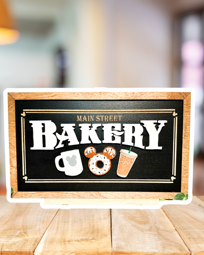 Main Street Bakery | Black | Hot & Iced Coffee | Park-Inspired Framed Sign | Wooden Wall Art & Handmade Home Decor | 10.9in x 18.5in