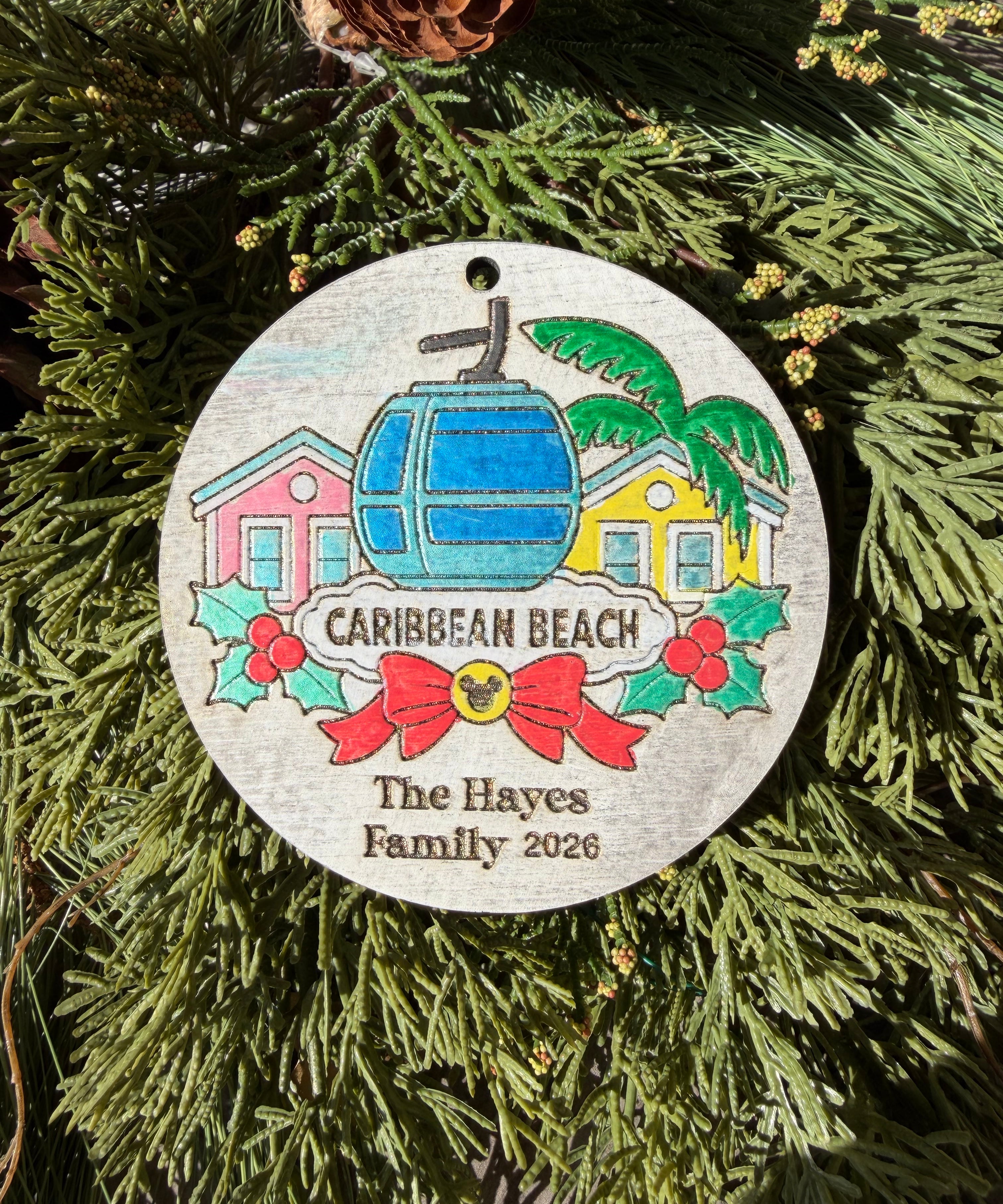 Finished Caribbean Beach ornament. The Hayes Family 2026 is sample personalization.