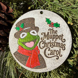 Finished hand-painted The Muppet Christmas Carol on evergreen greenery.