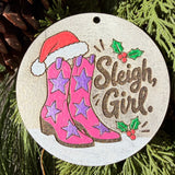 Finished hand-painted Sleigh, Girl! Cowboy Boots on evergreen greenery.