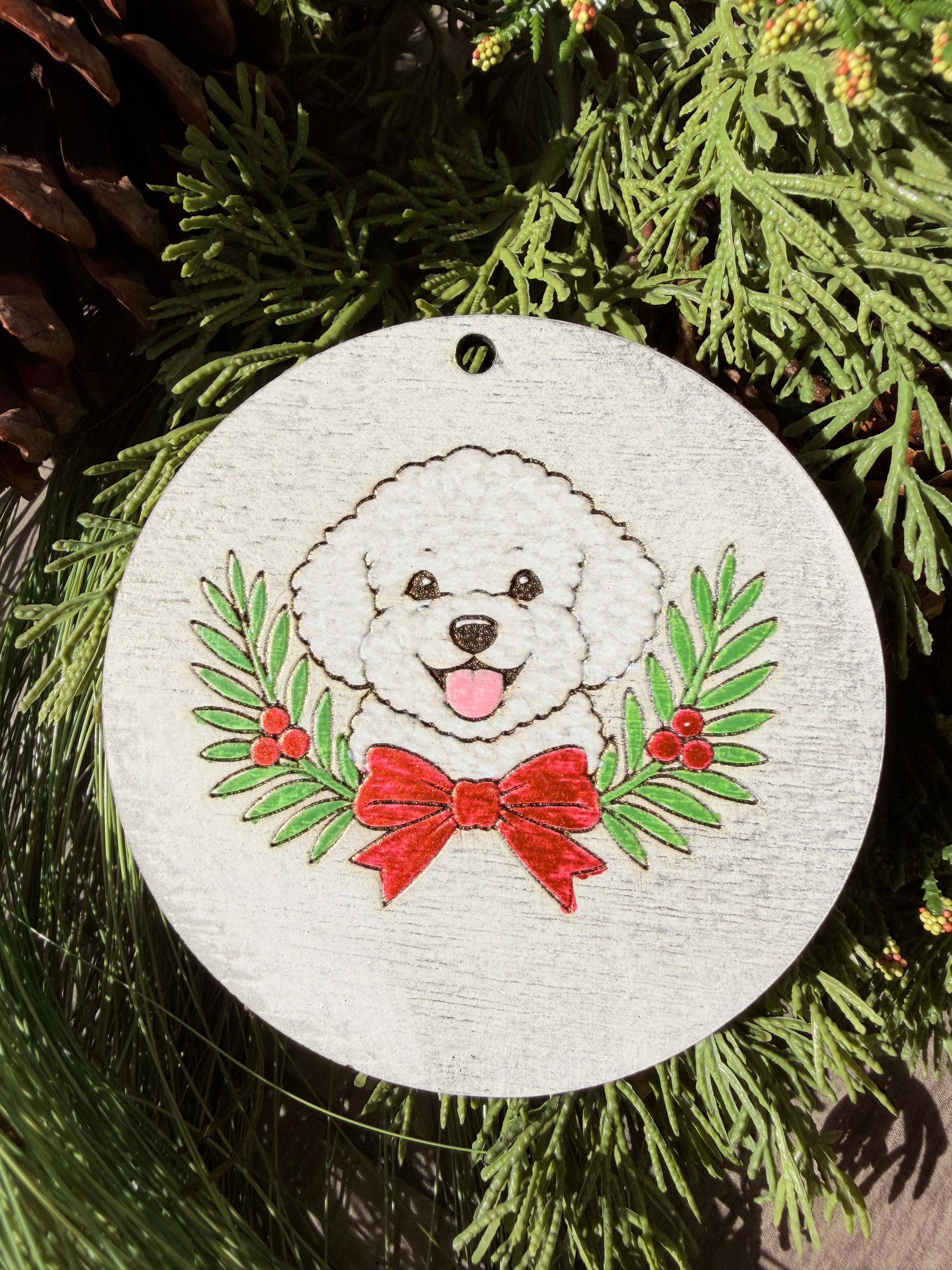 Finished hand-painted White Fluffy Dog & Holiday Bow on evergreen greenery.