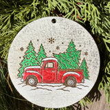Finished hand-painted Evergreen Red Pickup Truck on evergreen greenery.