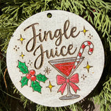 Finished hand-painted Jingle Juice on evergreen greenery.