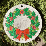 Finished hand-painted Holly Wreath & Red Bow on evergreen greenery.